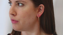 Load and play video in Gallery viewer, 10K Polished Oval Hoop Earrings
